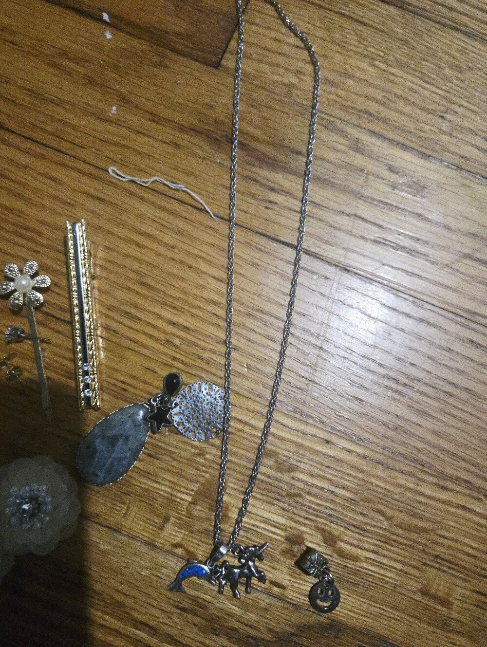 Silver-Tone Dolphin Charm Necklace with Blue Accent and Other Vintaged Jewerly
